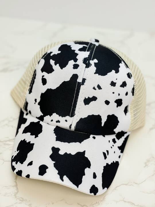 Criss-Cross Cow Print Caps - Jefferson Co. Boutique